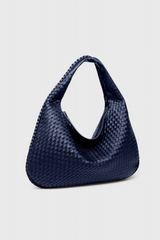 https://cdn.shopify.com/s/files/1/0964/1161/5556/files/Soera-WovenXL-bag-21-Photoroom_357707da-069b-4c3e-932c-adcfd3bee1bd.png?v=1771009288