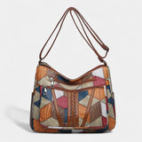 https://cdn.shopify.com/s/files/1/0964/1161/5556/files/imgi_10_Solara_mozaiek_leren_handtas_7.jpg?v=1771009290