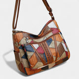 https://cdn.shopify.com/s/files/1/0964/1161/5556/files/imgi_5_Solara_mozaiek_leren_handtas_2.jpg?v=1771009290