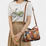 https://cdn.shopify.com/s/files/1/0964/1161/5556/files/imgi_9_Solara_mozaiek_leren_handtas_6.jpg?v=1771009291